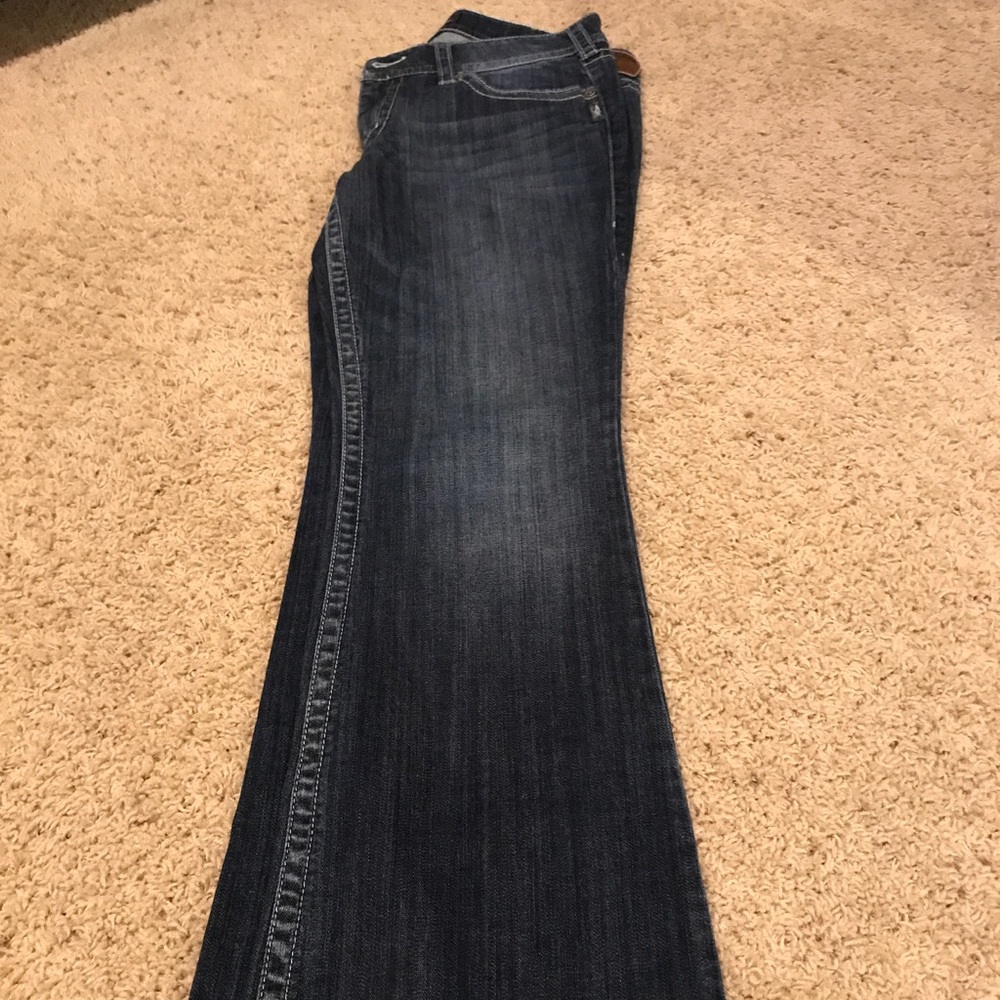 Silver jeans.